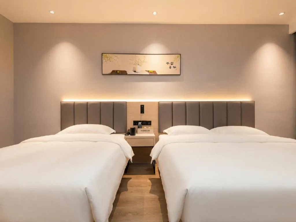 Bed in GreenTree Inn xinghua Middle Yingwu Road Express Hotel