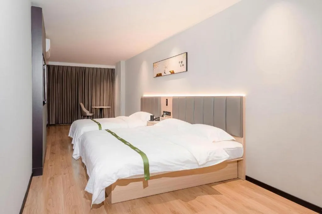Bed in GreenTree Inn xinghua Middle Yingwu Road Express Hotel