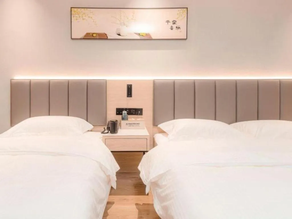 Bed in GreenTree Inn xinghua Middle Yingwu Road Express Hotel