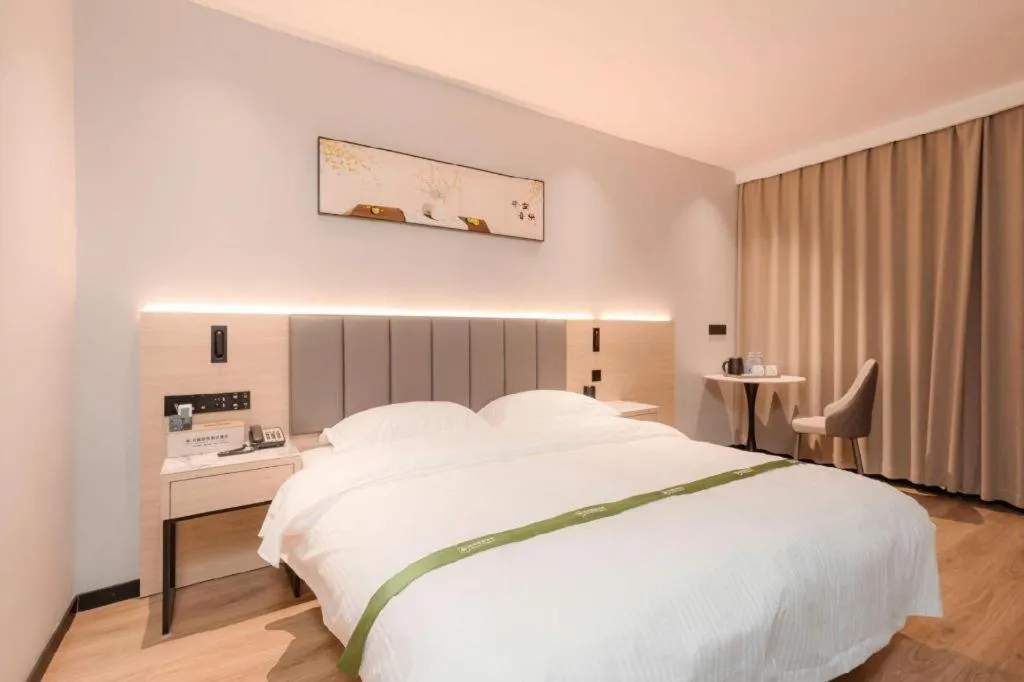 Bed in GreenTree Inn xinghua Middle Yingwu Road Express Hotel