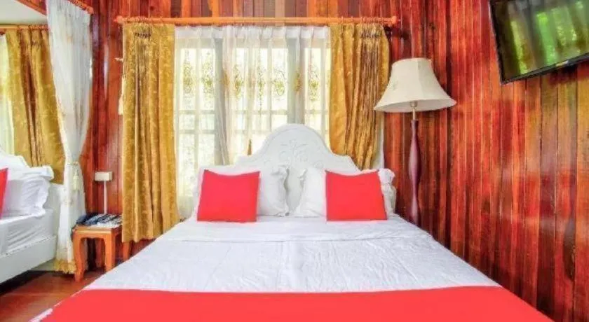 Bed in Thaiasia Goldensea Resort