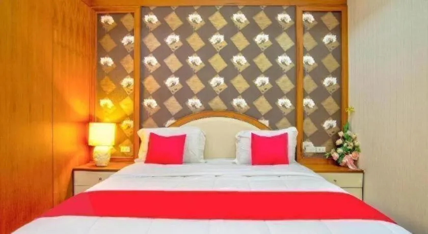 Bed in Thaiasia Goldensea Resort