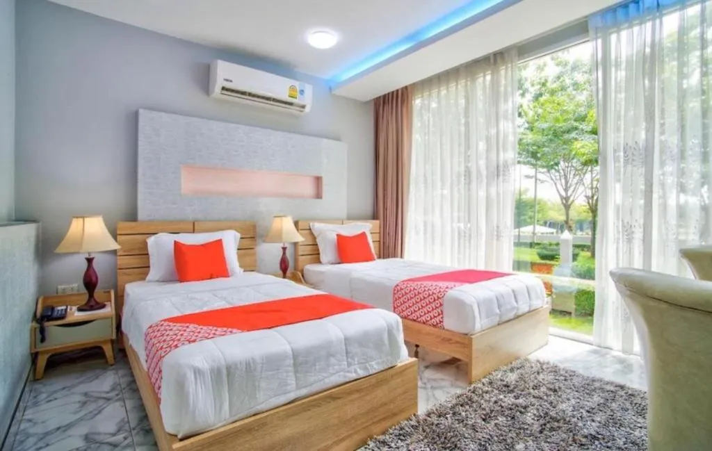 Bed in Thaiasia Goldensea Resort