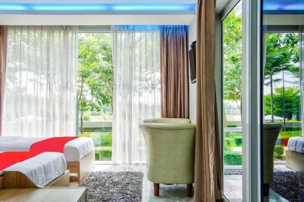 Bed in Thaiasia Goldensea Resort