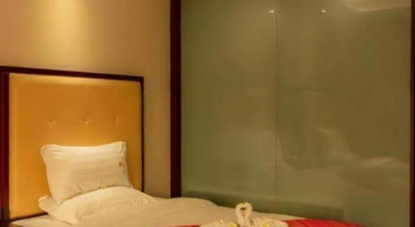 Bed in Xishuangbanna Hotel Managed by Xandria Hotel