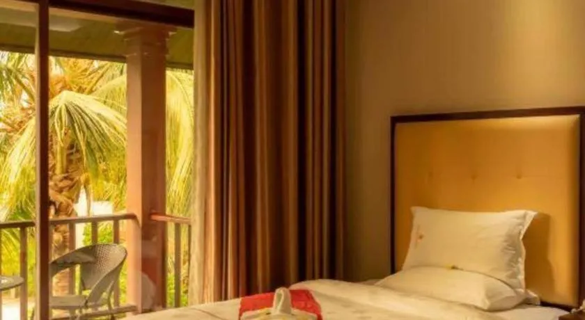 Bed in Xishuangbanna Hotel Managed by Xandria Hotel