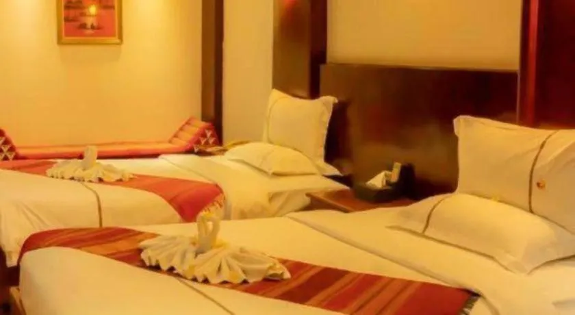 Bed in Xishuangbanna Hotel Managed by Xandria Hotel