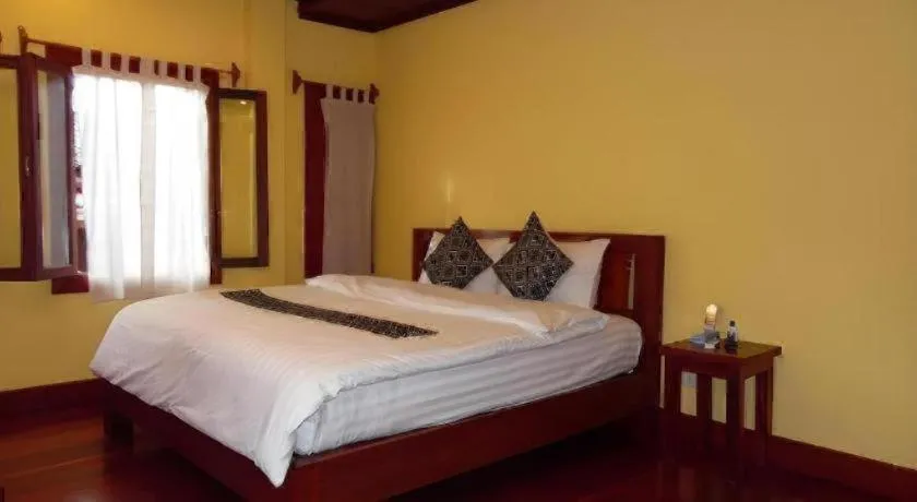 Bed in Xishuangbanna Hotel Managed by Xandria Hotel