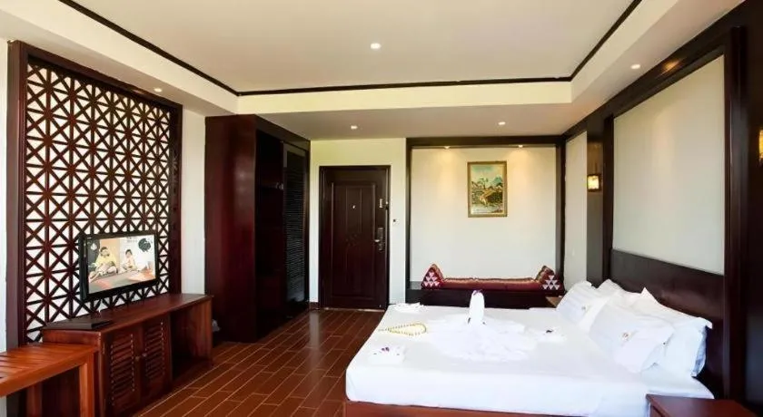 Bed in Xishuangbanna Hotel Managed by Xandria Hotel