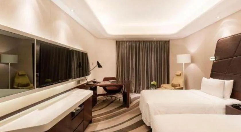 Bed in Hotel Maxmelim Beijing