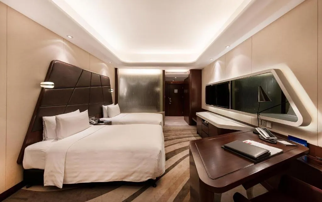 Bed in Hotel Maxmelim Beijing