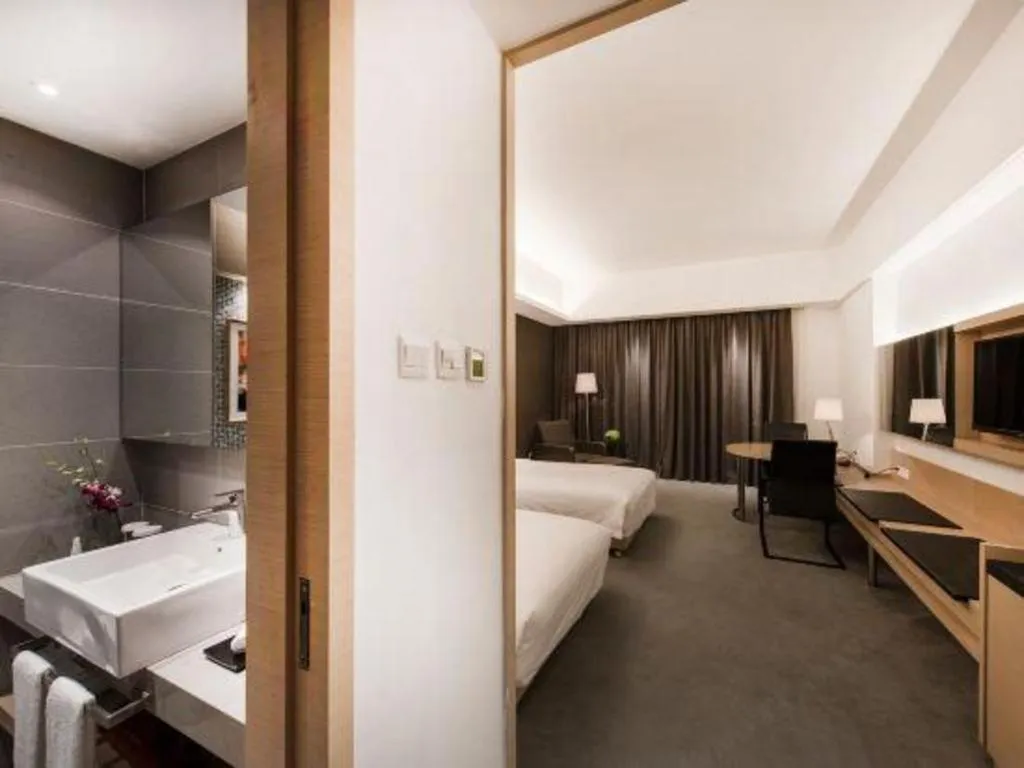 Bed in Hotel Maxmelim Beijing