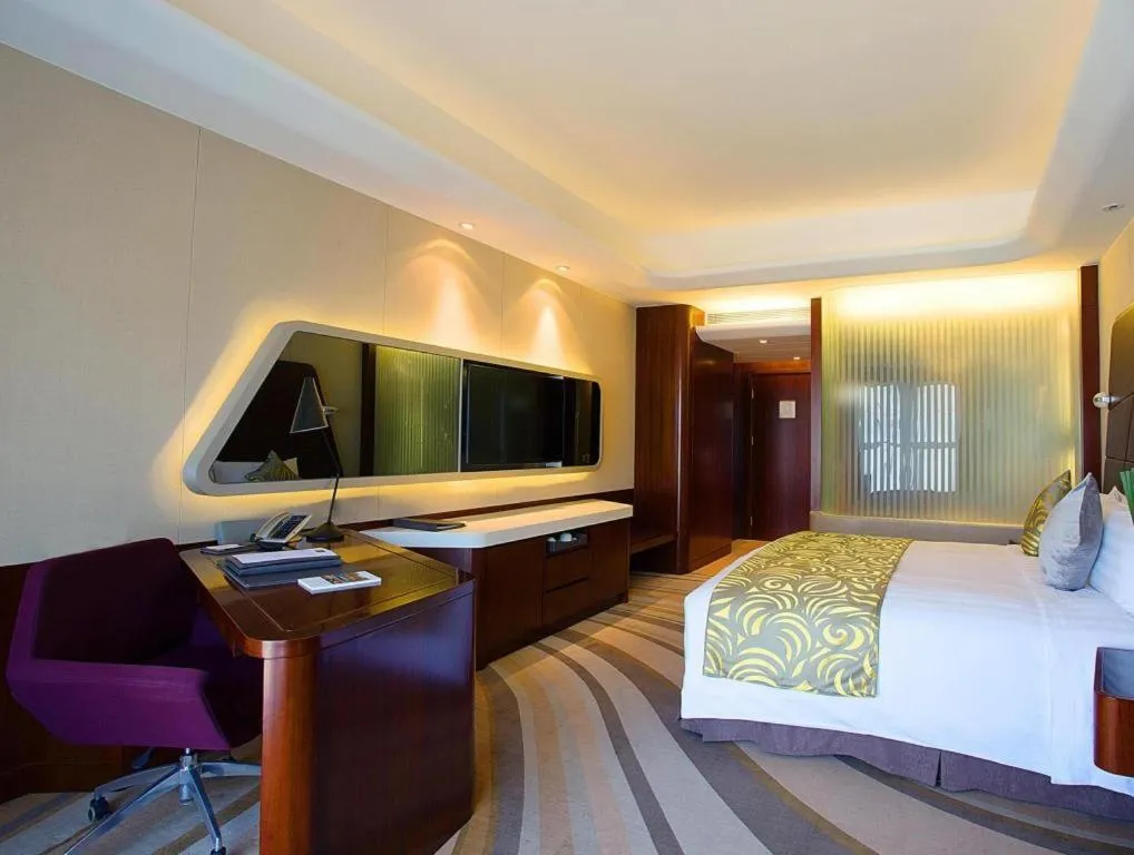 Bed in Hotel Maxmelim Beijing