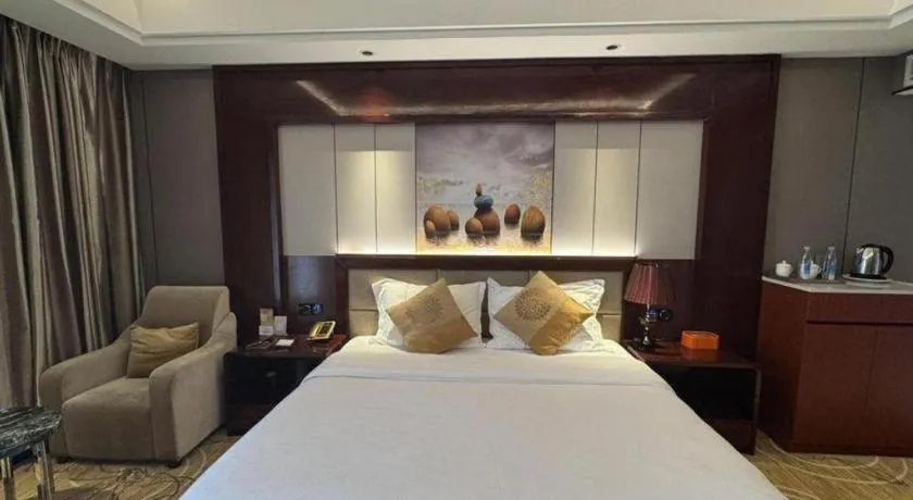 Bed in Xin Sheng Da Hong Sheng International Hotel