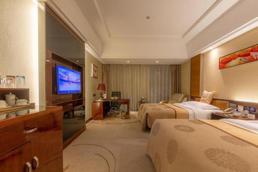 Bed in Xin Sheng Da Hong Sheng International Hotel