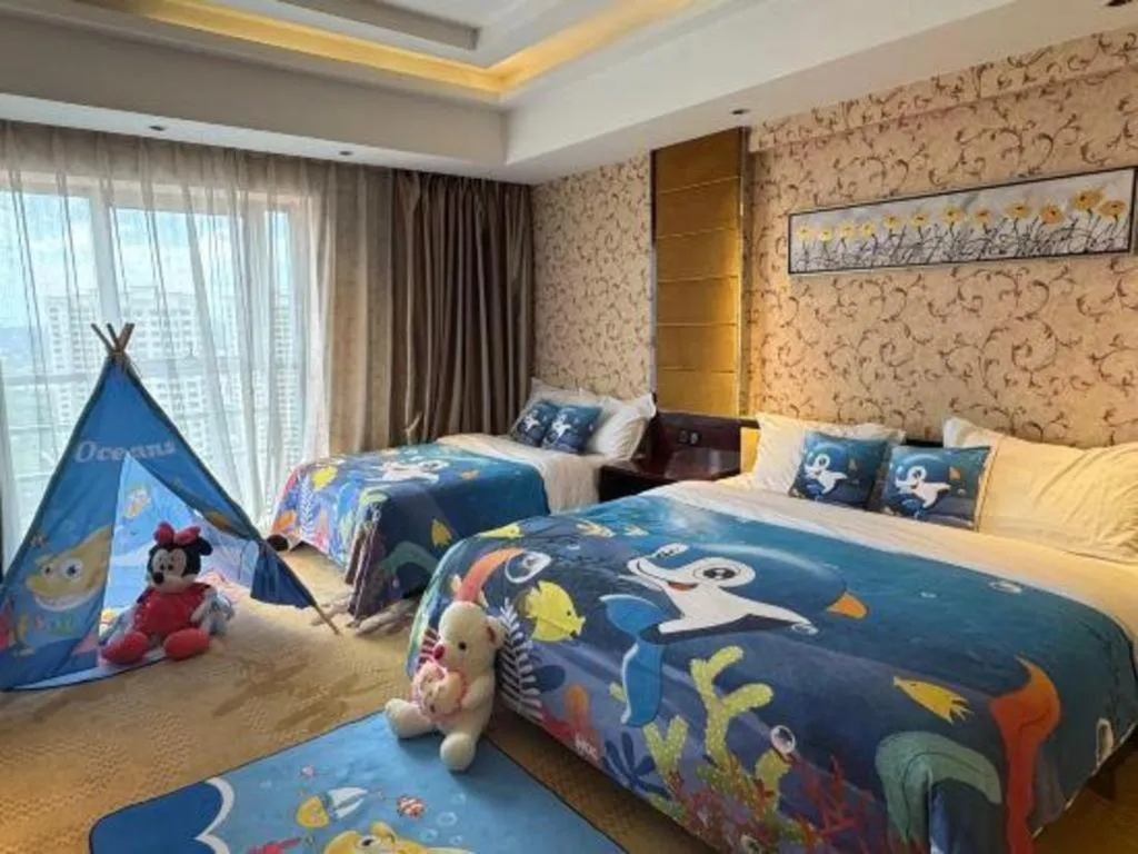 Bed in Xin Sheng Da Hong Sheng International Hotel