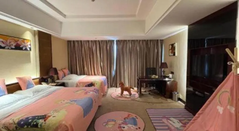 Bed in Xin Sheng Da Hong Sheng International Hotel