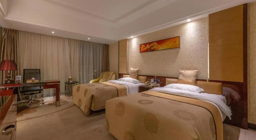 Bed in Xin Sheng Da Hong Sheng International Hotel