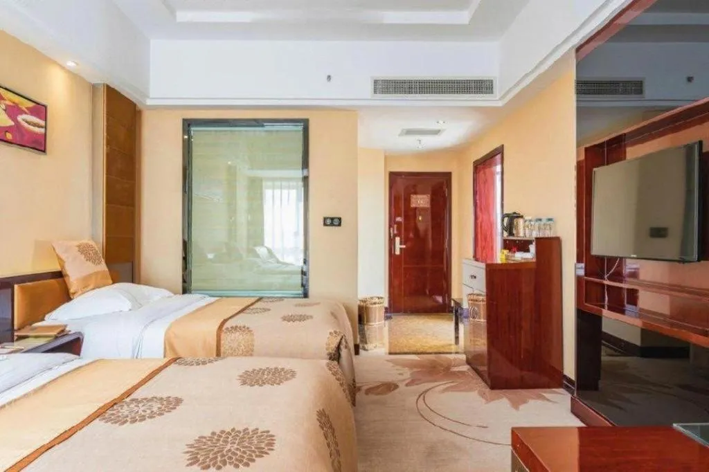 Bed in Xin Sheng Da Hong Sheng International Hotel