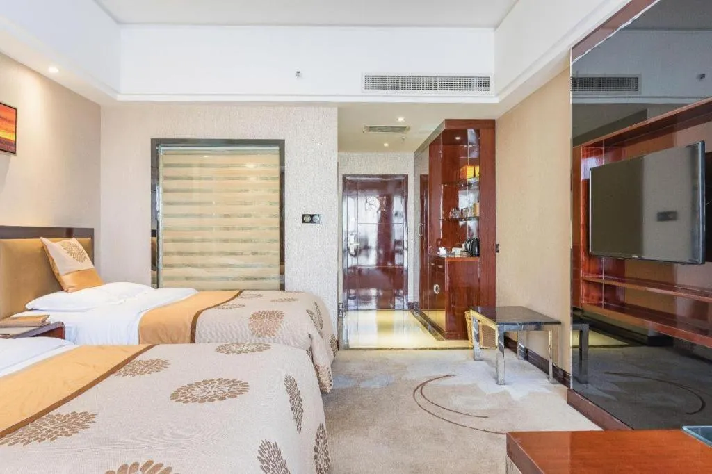 Bed in Xin Sheng Da Hong Sheng International Hotel