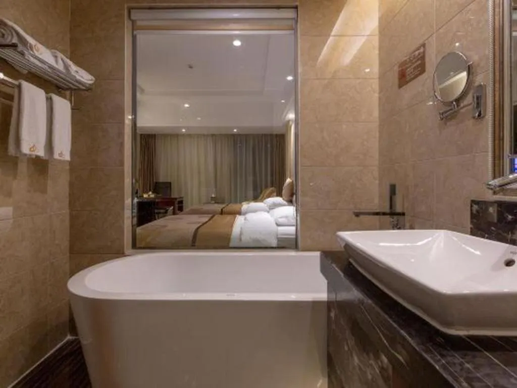 Bed in Xin Sheng Da Hong Sheng International Hotel