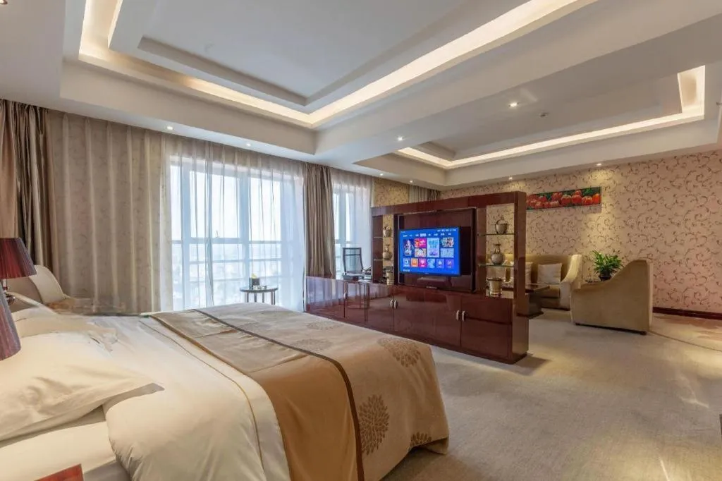 Bed in Xin Sheng Da Hong Sheng International Hotel