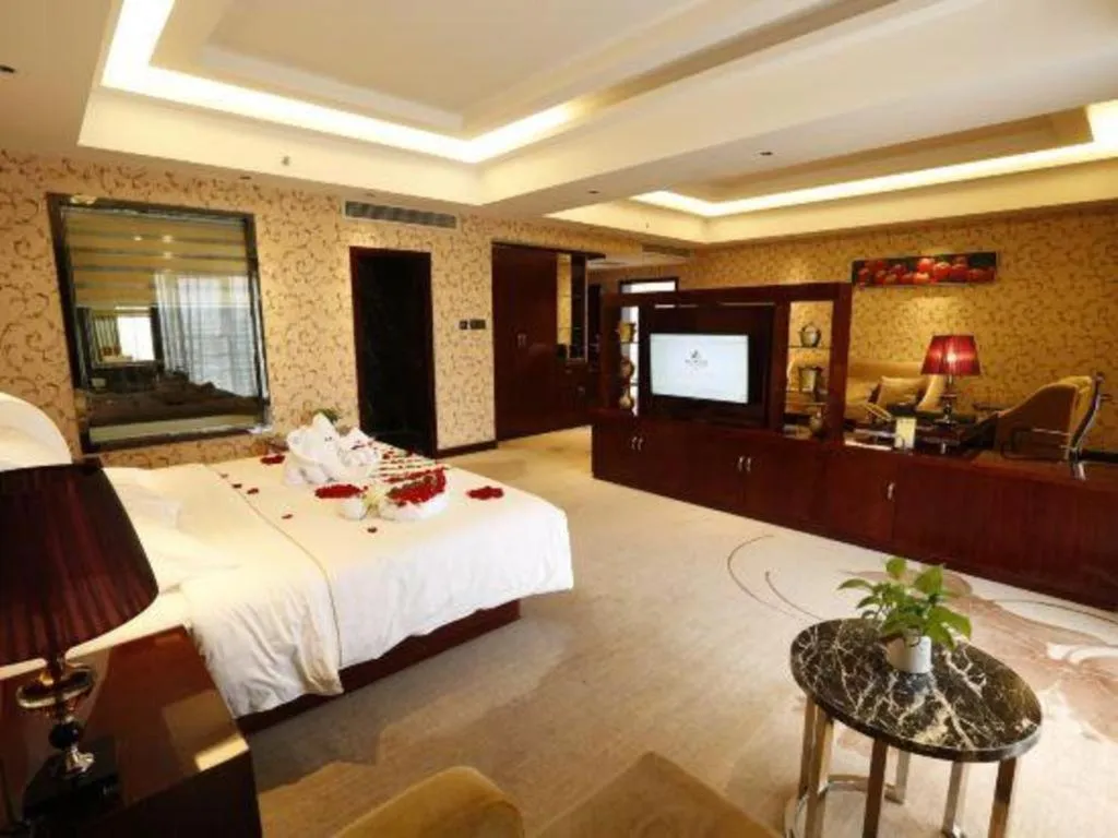 Bed in Xin Sheng Da Hong Sheng International Hotel
