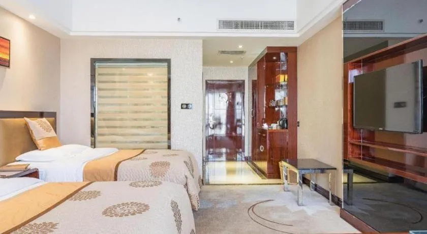 Bed in Xin Sheng Da Hong Sheng International Hotel