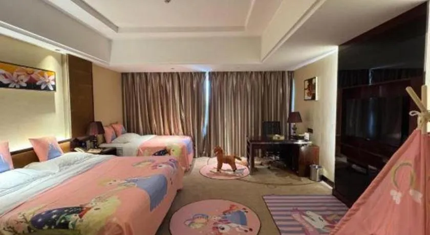 Bed in Xin Sheng Da Hong Sheng International Hotel