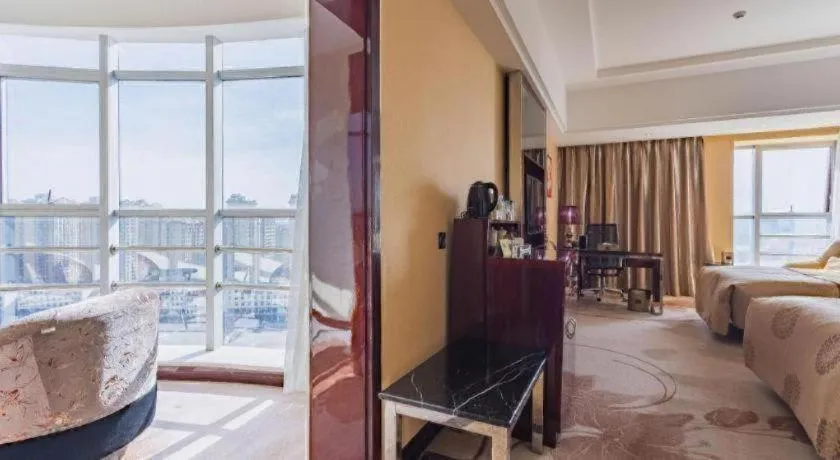 Bed in Xin Sheng Da Hong Sheng International Hotel