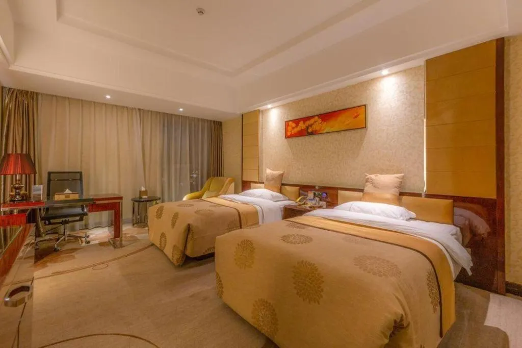 Bed in Xin Sheng Da Hong Sheng International Hotel