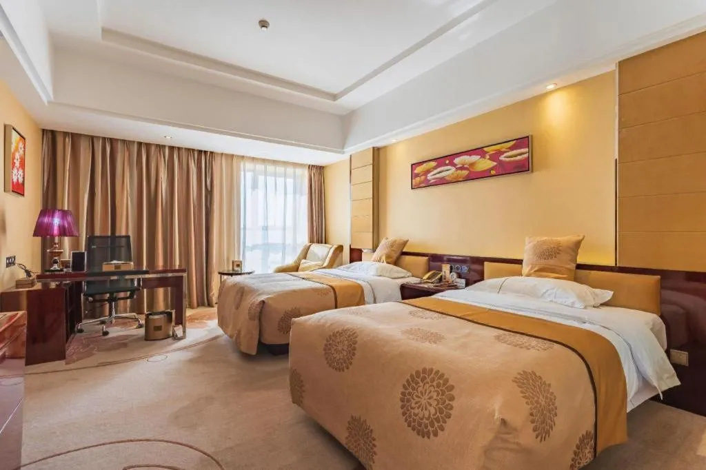 Bed in Xin Sheng Da Hong Sheng International Hotel