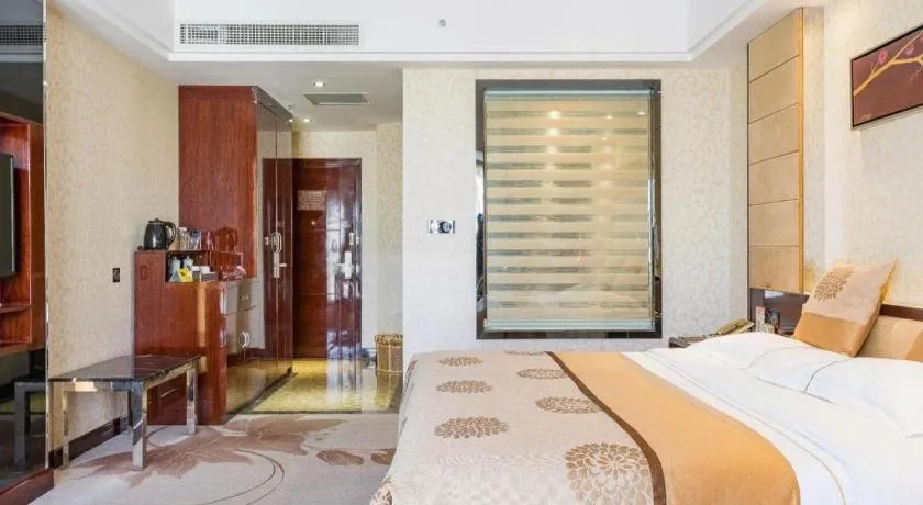 Bed in Xin Sheng Da Hong Sheng International Hotel