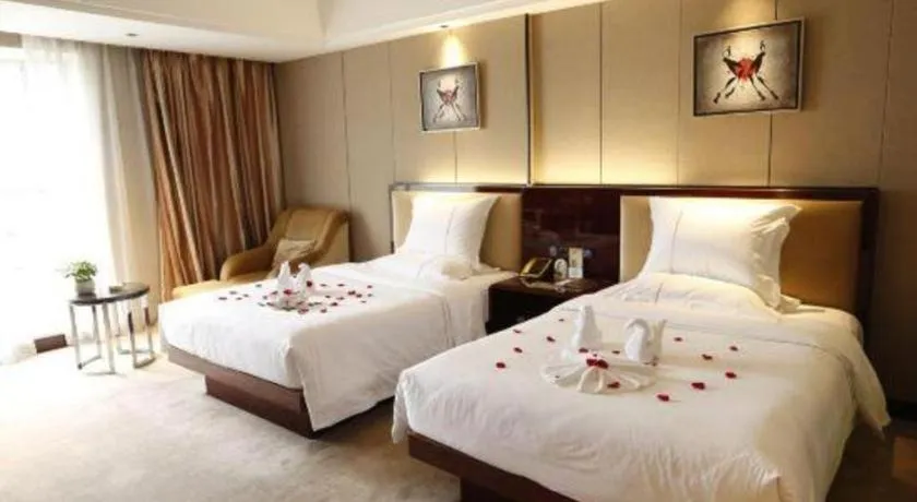 Bed in Xin Sheng Da Hong Sheng International Hotel