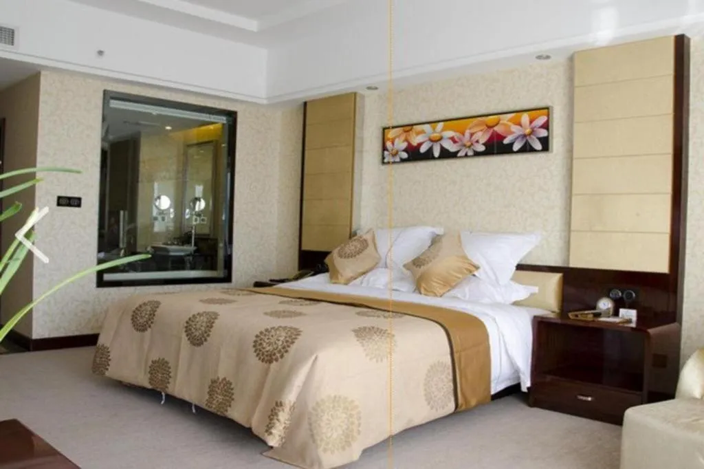 Bed in Xin Sheng Da Hong Sheng International Hotel