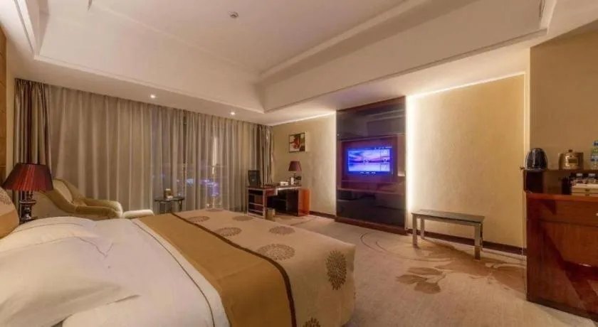 Bed in Xin Sheng Da Hong Sheng International Hotel