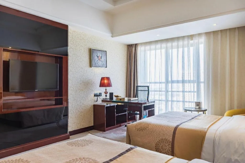 Bed in Xin Sheng Da Hong Sheng International Hotel