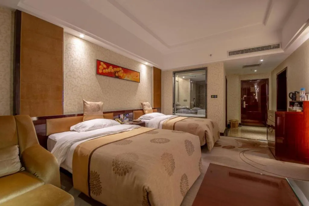 Bed in Xin Sheng Da Hong Sheng International Hotel