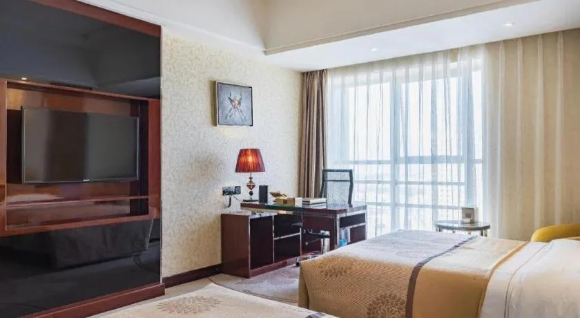 Bed in Xin Sheng Da Hong Sheng International Hotel