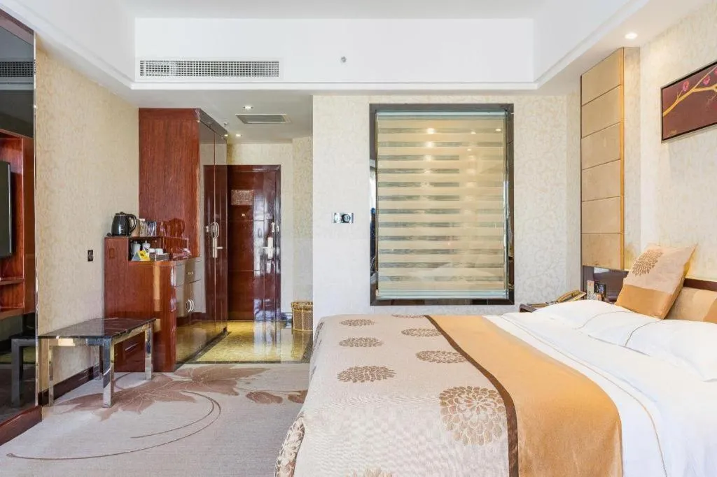 Bed in Xin Sheng Da Hong Sheng International Hotel