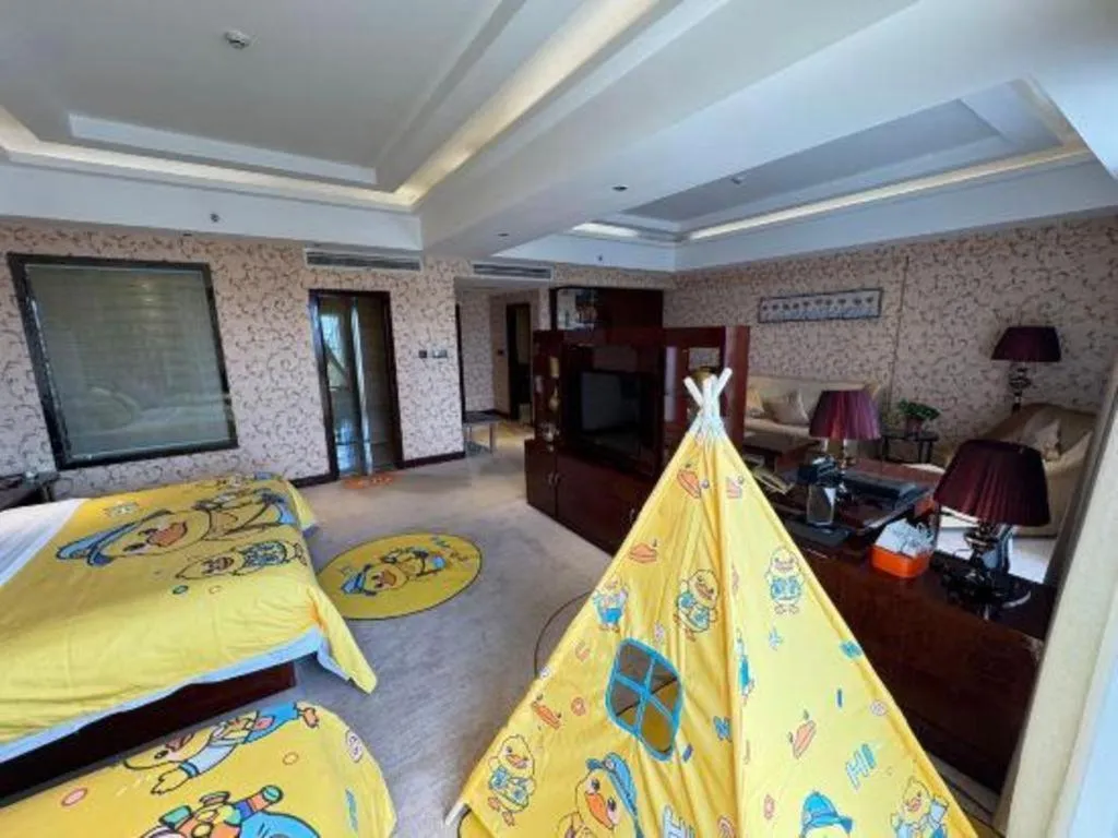 Bed in Xin Sheng Da Hong Sheng International Hotel