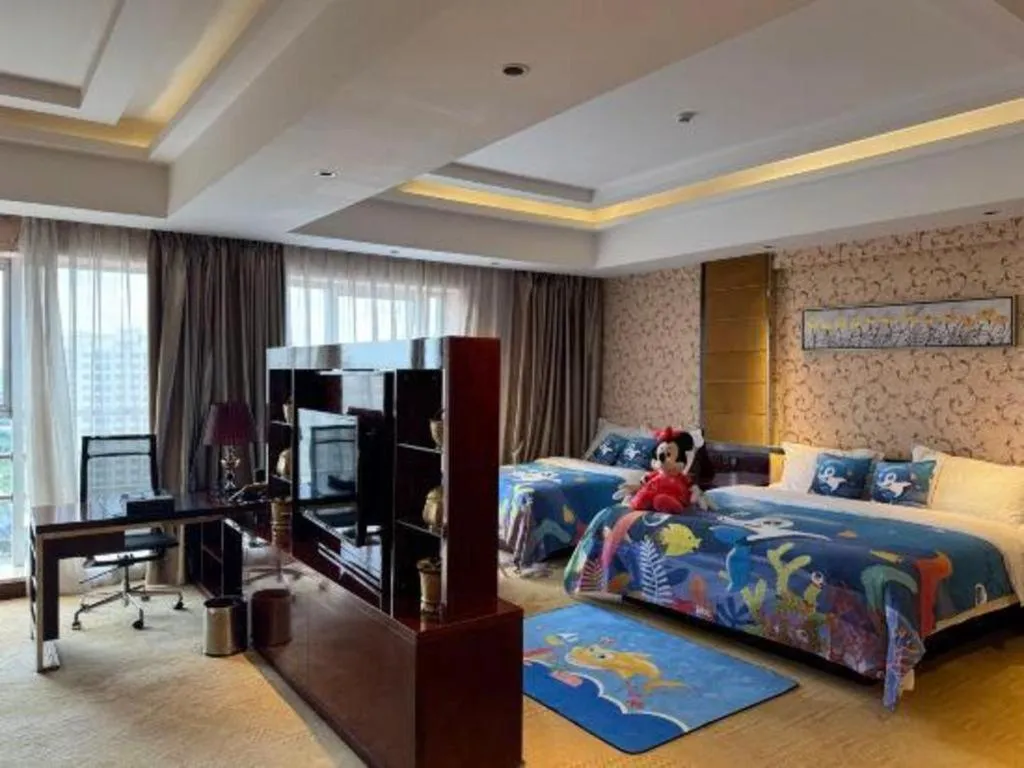 Bed in Xin Sheng Da Hong Sheng International Hotel