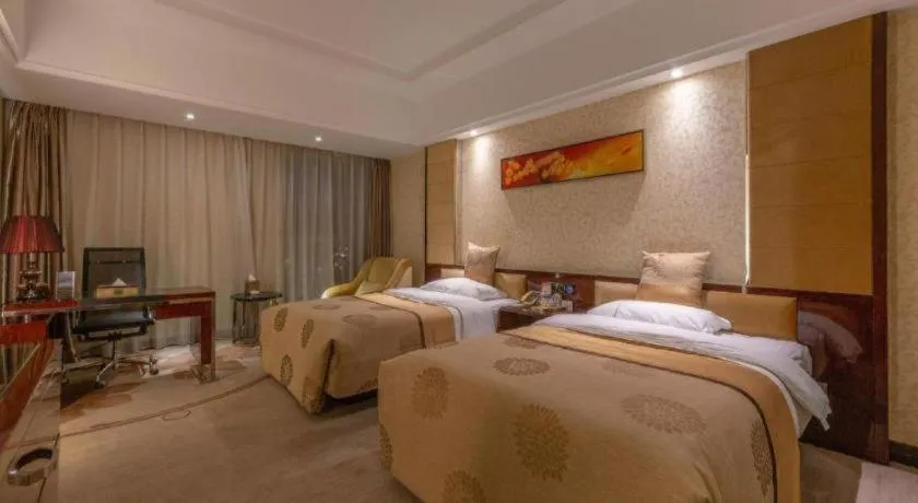 Bed in Xin Sheng Da Hong Sheng International Hotel