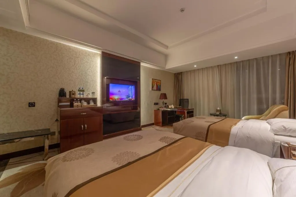 Bed in Xin Sheng Da Hong Sheng International Hotel