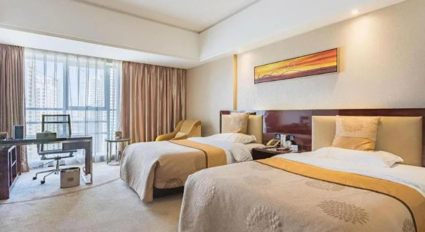 Bed in Xin Sheng Da Hong Sheng International Hotel