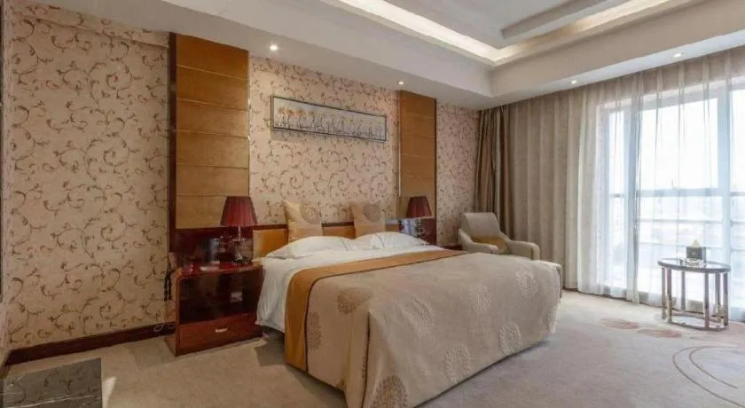 Bed in Xin Sheng Da Hong Sheng International Hotel