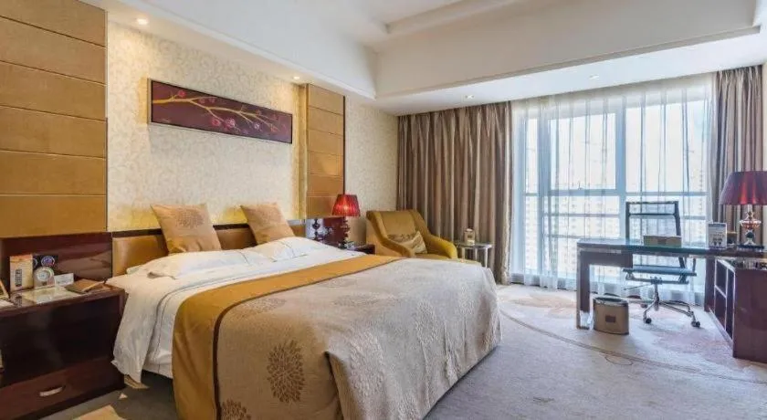 Bed in Xin Sheng Da Hong Sheng International Hotel