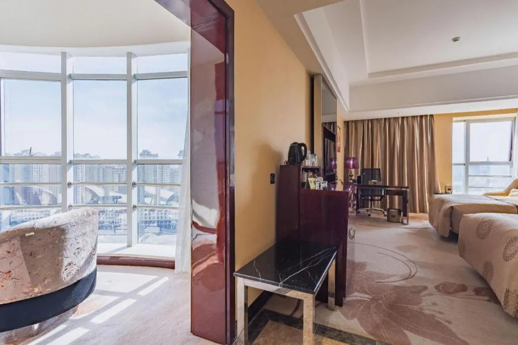 Bed in Xin Sheng Da Hong Sheng International Hotel