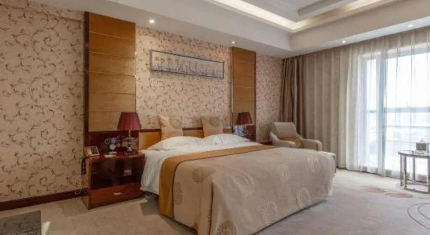 Bed in Xin Sheng Da Hong Sheng International Hotel