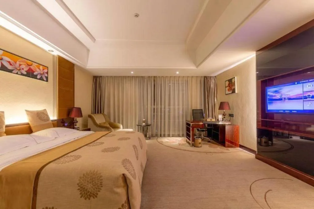 Bed in Xin Sheng Da Hong Sheng International Hotel